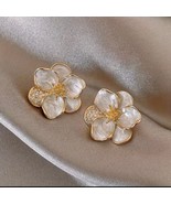 Earrings with leaf and flower design, bunch of cubic zirconia pearls - $27.44