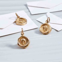 Bronze Wax Seal Skull Charm 17x10mm - $195.88 MXN