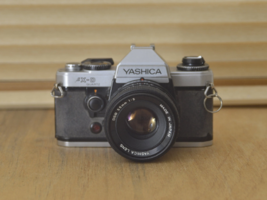 Lovely Yashica FX-D Quartz SLR with Yashica 55mm f2 lens. - $145.00