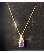 Authenticity Guarantee

14 Kt Gold And Amythist Pendant With 14 Kt Gold ... - $908.11 CAD
