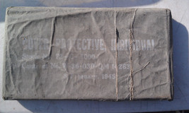 8OO39  BLISTER GAS SUIT, #72-C-1000, 02-08-1945 DATED, RIPPED PULL STRIP... - $18.39