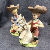 Vintage Boy &amp; Girl In Straw Hat W/ Ducks &amp; Rabbits Ceramic Figurines 5&quot; Tall - £7.70 GBP