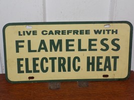 Vintage Live Carefree With Flameless Electric Heat Metal License Plate Sign - $44.55