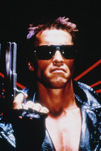 Arnold Schwarzenegger holding AMT Hardballer Longslide The Terminator 18x24 Post - $23.99