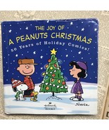 A Peanuts Christmas~50 Years Of Holiday Comics~Hardcover with Dust Jacket - $12.99