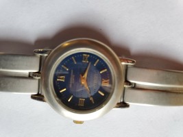 PRE-OWNED STAINLESS STEEL GENEVA WOMENS QUARTZ WATER RESISTANT  WRIST WATCH - $90.83 CAD