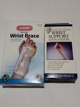 Lot of 2 Mediun Wrist Braces.  1 left, 1 universal. - $16.82
