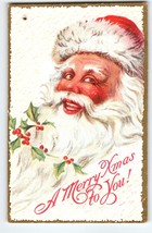 Santa Claus Postcard Christmas Greetings Jolly Face Embossed Hole Punch ... - £7.43 GBP