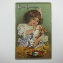 Easter Postcard Girl Holds Rabbit Colored Eggs in Nest Embossed Antique 1909 - £7.97 GBP