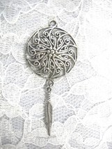 SINGLE FEATHER SWIRLING DESIGN CONCHO ALLOY PENDANT ON ADJ CORD NECKLACE - $6.30 CAD