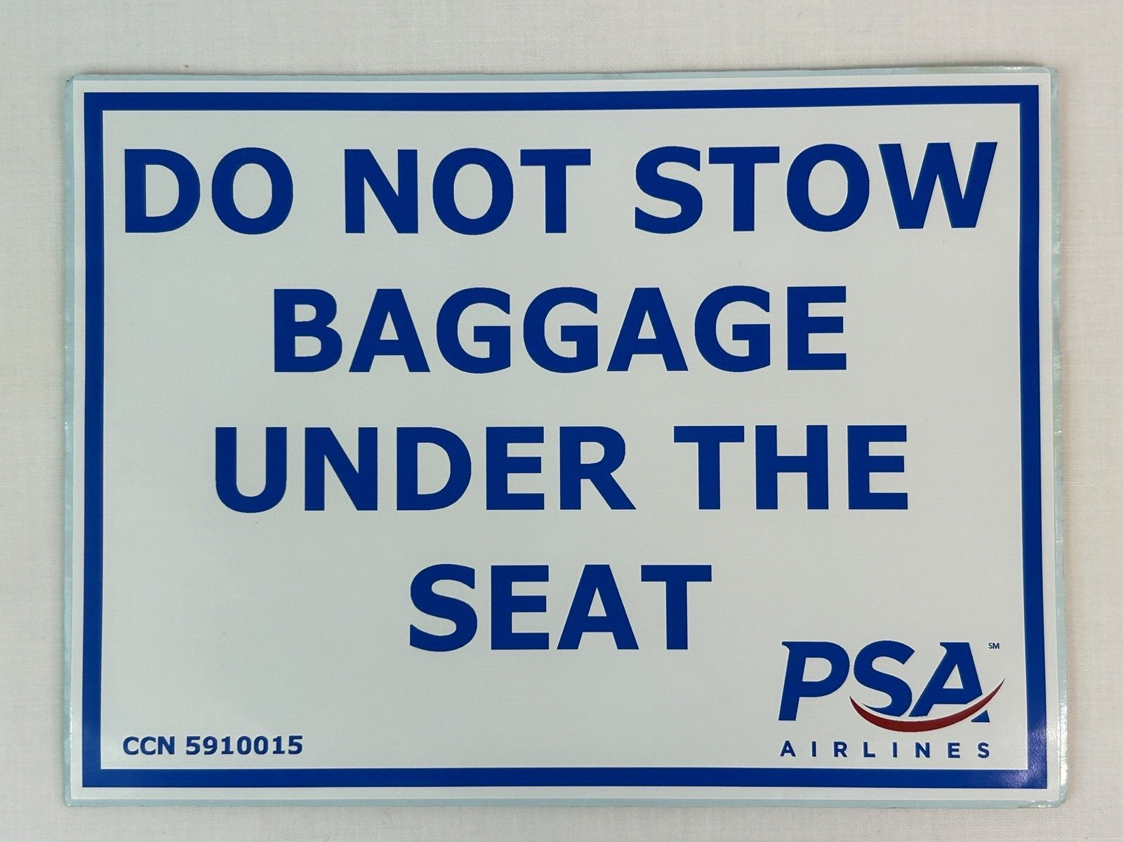 &quot;DO NOT STOW BAGGAGE UNDER THE SEAT&quot; STICKER 8&quot;X6&quot; - PSA AIRLINES - $4.95