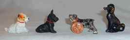 4 Old Painted Cast Iron Miniature Dogs Paperweights or Toys with One Advertising - $77.00