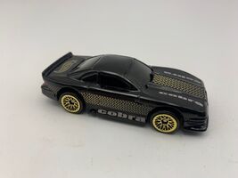 1997 Hot Wheels Gloss Black Mustang Cobra Loose Diecast 1:64 Gold Rims - $7.90