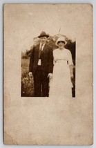 RPPC Lovely Young Woman Piercing Eyes Handsome Gentleman c1910 Postcard C25 - £7.03 GBP