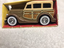 Buddy L Woody Wagon ( played with ) and box ~ about 4.75&quot; long - $10.00