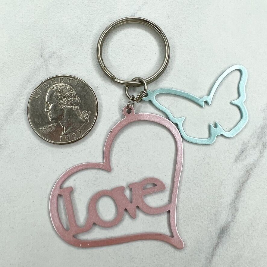Primary image for Pastel Pink and Blue Heart Love Butterfly Cut Out Keychain Keyring