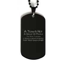 Funny Nurse Black Dog Tag, A Team Is Not A Group Of People That Work Together. A - £15.78 GBP