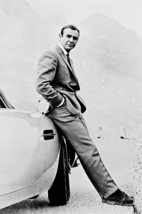 Sean Connery Leaning Against Aston Martin 18x24 Poster - $23.99