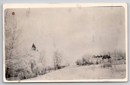 RPPC Town Street Snow Covered Trees Road Church Homes Postcard D23 - £7.95 GBP