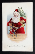 A Jolly Christmas To You Santa Holding Bells &amp; Horn Fairman Co Postcard c1914 - £10.21 GBP