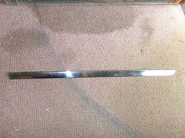 1949 Dodge RH PS Front Door Trim NOS 1252525 - $224.98