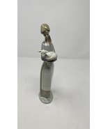 Lladro figurine #4505, Girl with Lamb - $30.00