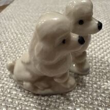 Vintage White Ceramic Poodle Figurines Lot Of 2 Blue Green Accents 1 1/2... - $309.51 MXN