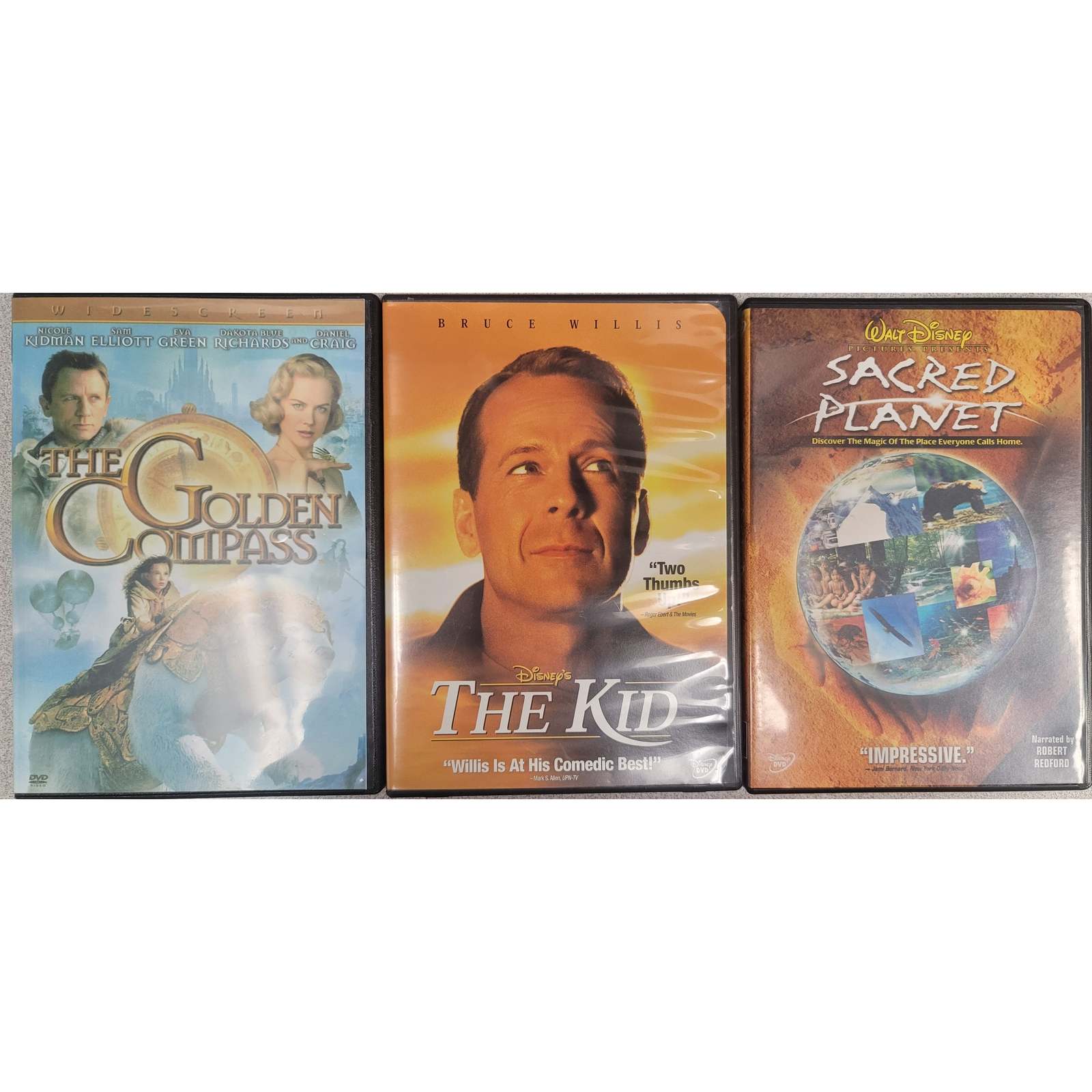 Primary image for Family DVD Movie Triple Play: The Kid, Golden Compass, Sacred Planet