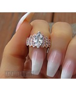 Rose Gold Plated Sterling Silver Marquise Ring: Pink CZ Accent Stones - $1,221.93 MXN