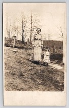 RPPC Edwardian Mother In Plaid with Sweet Child in Yard Postcard I22 - £7.04 GBP