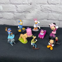 Lot of 11 assorted Disney figurine Mickey Minnie goofy incredibles simba... - $20.00