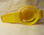 Vintage Tupperware gadget #779-7: Yellow Ege-Yolk Seperator - $4.00