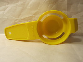 Vintage Tupperware gadget #779-7: Yellow Ege-Yolk Seperator - £3.14 GBP