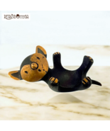 Cat design candle holder in bronze designed by Walter Bosse for Herta Ba... - $5,105.19 MXN