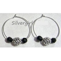 1.5 in black glitter silver hoop earrings thumb200