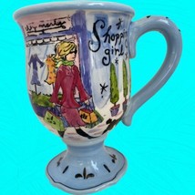 Jennifer Brinley Certified International Shopping Girl Tall Pedestal Coffee Mug  - £11.21 GBP