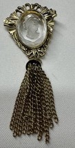 necklace pendant clear Intaglio cameo. Tassel ornate.  Gold tone.  4” - $24.70