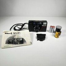 Nikon L35AF Pikaichi 35mm Compact Autofocus Film Camera + Lens Cap + Film + Batt - $197.99