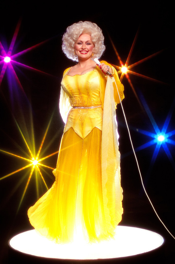 Primary image for Dolly Parton striking pose in yellow dress with microphone studio lights 24x18 P