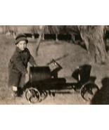 Circa 1910 - 2 Photographs Boy Dressed In Coat And Hat Playing With Peda... - $27.16 CAD