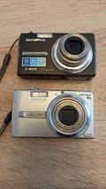 Two digital cameras. Condition unknown. No batteries or charging - £28.61 GBP