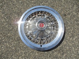 One genuine 1974 to 1979 Ford Torino Elite 15 inch wire spoke hubcap wheel cover - $46.40