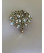 Authenticity Guarantee

MARIO BUCCELLATI 18k GOLD LEAF BROOCH WITH 13 DI... - $74,400.06 MXN