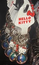 Universal Studios Parks Hello Kitty Globe Metal Enamel Keychain - $29.99