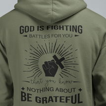 Heavy Blend™ Hooded Sweatshirt &quot;God is Fighting&quot; Printed on Back Black Font - $42.97