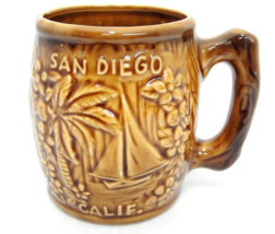 Vintage San Diego Souvenir Mug Wood Grain Embossed Boat Palm Trees Made in Japan - £15.81 GBP