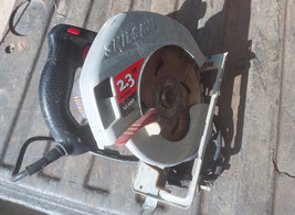 22NN57 SKILSAW 54HD, HEIGHT ADJUSTER IS MISSING (NUT, NO WRENCH), TESTS ... - $18.63