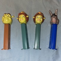 Lot Of 4 PEZ Dispensers Disney Pixar Shrek Fiona Donkey - $3.80
