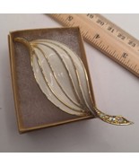 White and gold tone leaf brooch with rhinestones - $18.00
