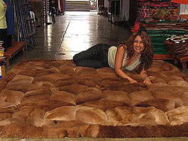 Brown alpaca fur carpet with rhombus designs from Peru, 90 x 60 cm - $184.50
